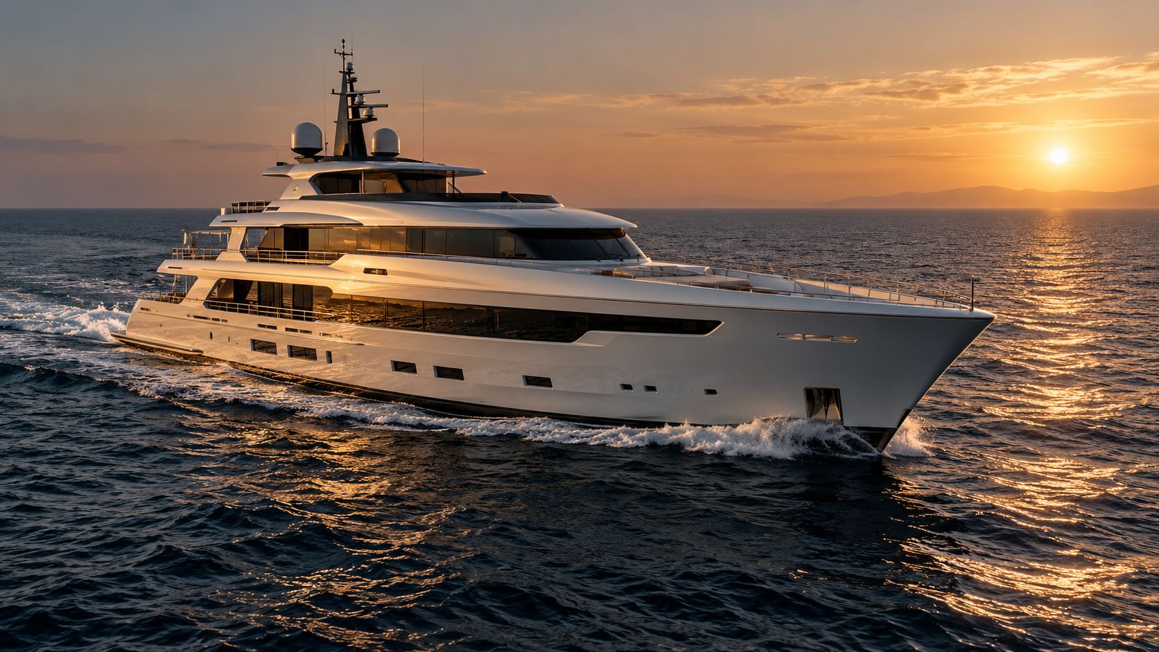 Modern superyacht cruising at golden hour